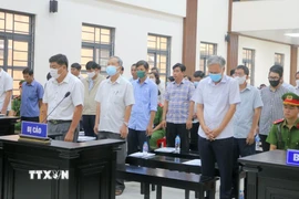 Các bị cáo tại phiên tòa sơ thẩm ngày 28/1/2026. (Ảnh: Công Mạo/TTXVN)