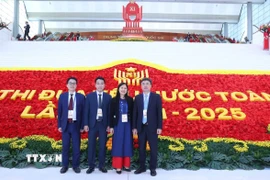 Đại biểu chụp ảnh lưu niệm tại đại hội. (Ảnh: Văn Điệp/TTXVN)