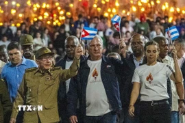 Đại tướng Raúl Castro Ruz, Chủ tịch Miguel Díaz-Canel. (Ảnh: TTXVN phát)