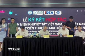 Quang cảnh lễ ký kết. (Ảnh: TTXVN phát)