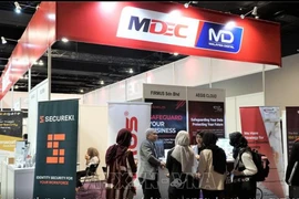 Gian hàng trưng bày của Tập đoàn Kinh tế kỹ thuật số Malaysia (MDEC) tại một triển lãm. (Nguồn: TTXVN)