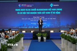 Ông Phan Đức Trung, Chủ tịch Hiệp hội Blockchain và Tài sản số Việt Nam, trình bày tham luận tại sự kiện. (Ảnh: Quốc Dũng/TTXVN)