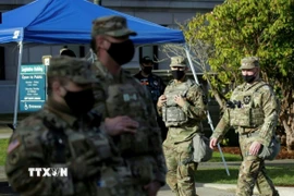 (Tư liệu) Lực lượng vệ binh quốc gia Mỹ gác tại Olympia, bang Washington. (Ảnh: Getty Images/TTXVN)