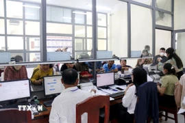 Hoạt động tại Trung tâm phục vụ hành chính công xã Bắc Bình (Lâm Đồng). (Ảnh: Hồng Hiếu - TTXVN) 