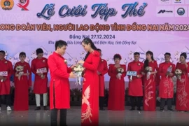 Lễ cưới tập thể cho công nhân có hoàn cảnh khó khăn ở Đồng Nai (TTXVN phát)