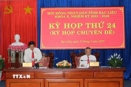 Chủ tọa điều hành kỳ họp. (Ảnh: Tuấn Kiệt/TTXVN)