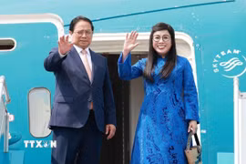 Thủ tướng Phạm Minh Chính và Phu nhân Lê Thị Bích Trân rời Thủ đô Hà Nội, lên đường tham dự Hội nghị Thượng đỉnh BRICS mở rộng năm 2025 tại Brazil. (Ảnh: Dương Giang/TTXVN) 