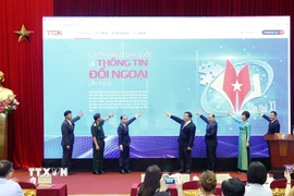 Nghi thức khai trương Trang web chính thức của Giải thưởng toàn quốc về Thông tin đối ngoại lần thứ XI. (Ảnh: Phương Hoa/TTXVN)