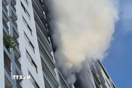 Vụ cháy tại chung cư phường Nam Nha Trang. (Ảnh: TTXVN)