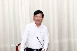 Ông Võ Văn Minh, Phó Bí thư Thành ủy, Chủ tịch Hội đồng Nhân dân Thành phố Hồ Chí Minh, Chủ tịch Ủy ban Bầu cử Thành phố chủ trì Phiên họp. (Ảnh: Xuân Khu/TTXVN)