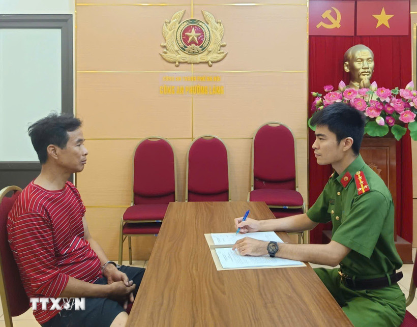 Đối tượng Hoàng Cao Sơn tại cơ quan Công an. (Ảnh: TTXVN phát)