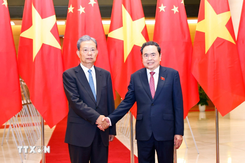 Chủ tịch Quốc hội Trần Thanh Mẫn đón Ủy viên trưởng Nhân đại toàn quốc Trung Quốc Triệu Lạc Tế. (Ảnh: Doãn Tấn/TTXVN)