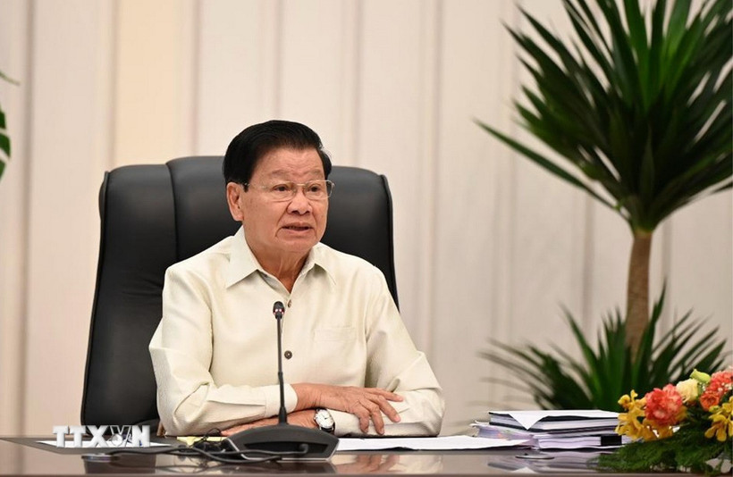 Tổng Bí thư, Chủ tịch nước Lào Thongloun Sisoulith phát biểu tại Lễ kỷ niệm. (Ảnh: Xuân Tú/TTXVN)