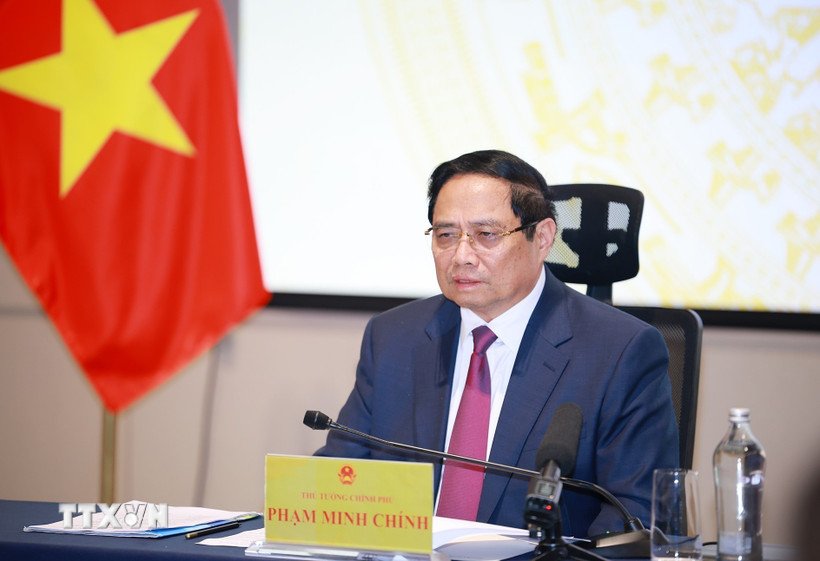 Thủ tướng Phạm Minh Chính chủ trì phiên họp thứ 23 của Ban Chỉ đạo quốc gia về phòng, chống khai thác hải sản bất hợp pháp, không báo cáo, không theo quy định (IUU) từ điểm cầu Thành phố Hồ Chí Minh. (Ảnh: Dương Giang/TTXVN)