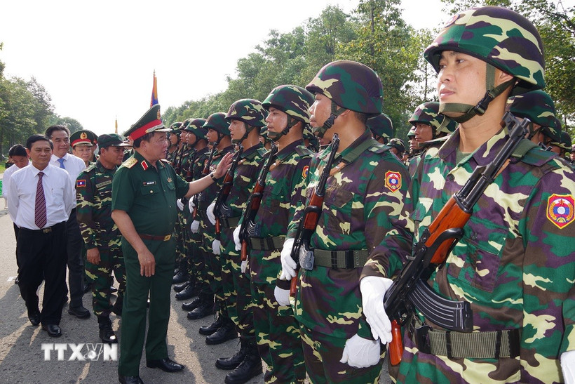 Thượng tướng Hoàng Xuân Chiến, Ủy viên Trung ương Đảng, Thứ trưởng Bộ Quốc phòng đã đến thăm hỏi các đoàn quân đội Trung Quốc, Lào và Campuchia đang tham gia luyện tập tại tỉnh Bình Dương. (Ảnh: TTXVN phát)