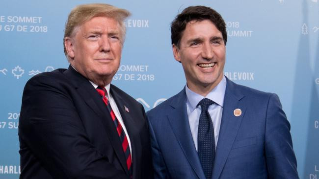 Tổng thống Mỹ Donald Trump và Thủ tướng Canada Justin Trudeau. (Nguồn: AFP) Mỹ và Canada đánh giá tích cực Hiệp định Thương mại tự do Bắc Mỹ ảnh 1