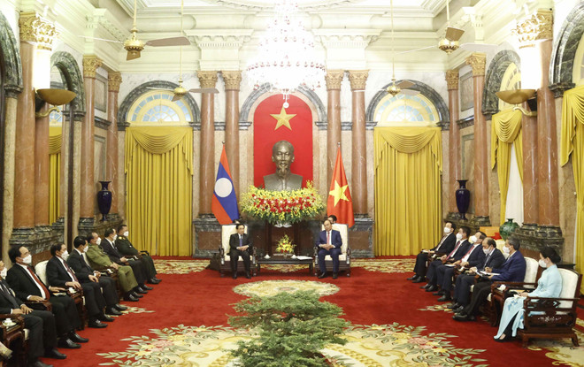 [Photo] Chủ tịch nước Nguyễn Xuân Phúc tiếp Thủ tướng Lào ảnh 2