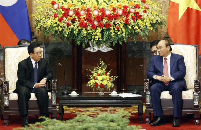 [Photo] Chủ tịch nước Nguyễn Xuân Phúc tiếp Thủ tướng Lào ảnh 4