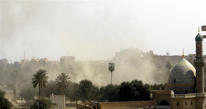 Tên lửa rơi trúng khu vực sân bay Baghdad và gần căn cứ quân sự Mỹ ảnh 1