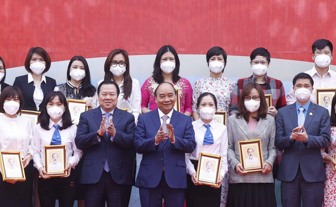 Chủ tịch nước dự lễ phát động thi đua ngành dệt may và da giày ảnh 1