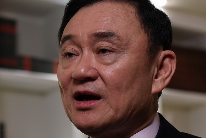 Cựu Thủ tướng Thái Lan Thaksin bị buộc tội lăng mạ hoàng gia ảnh 1