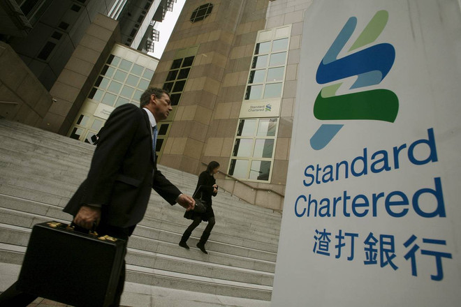 Standard Chartered lỗ ròng tới 2,36 tỷ USD trong năm 2015 ảnh 1