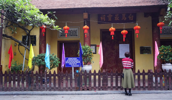 [Photo] Đường phố Hà Nội tĩnh lặng lạ thường sáng mùng Một Tết ảnh 6