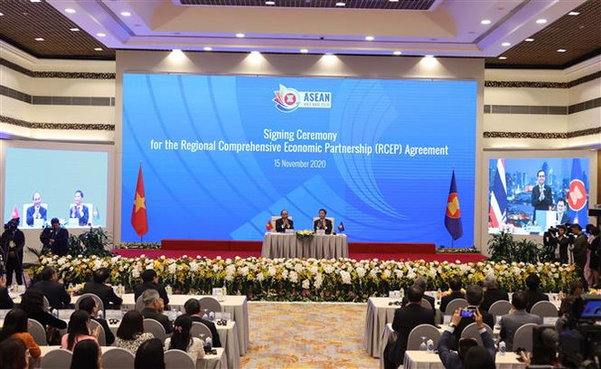 Quang cảnh buổi lễ ký kết RCEP. (Ảnh: Thống Nhất/TTXVN) Thái Lan đang chuẩn bị cho việc thực hiện Hiệp định RCEP ảnh 1