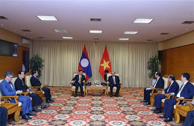 Việt Nam luôn nỗ lực hết sức mình tăng cường hợp tác với Lào ảnh 1