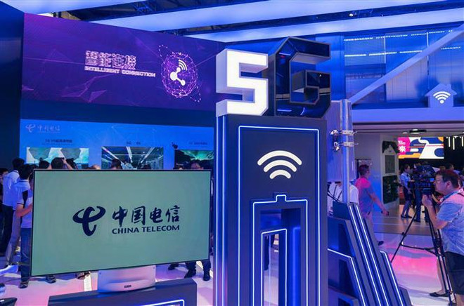 Công nghệ 5G của China Telecom từng được giới thiệu tại triển lãm thế giới di động ở Thượng Hải, Trung Quốc. (Nguồn: AFP/TTXVN) Mạng 5G đóng góp gần 900 tỷ USD cho kinh tế châu Á trong 15 năm tới ảnh 1