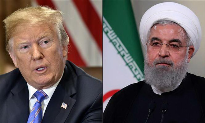 Tổng thống Mỹ Donald Trump (trái) và Tổng thống Iran Hassan Rouhani. (Nguồn: AFP/TTXVN) Căng thẳng Mỹ-Iran: Tehran cảnh báo hậu quả nếu chiến tranh nổ ra ảnh 1