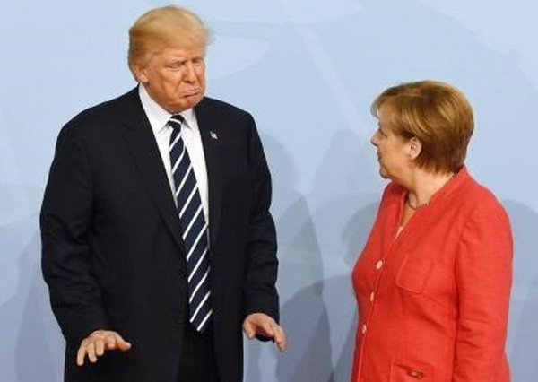 Bà Angela Merkel bày tỏ quan ngại trước quyết định của ông Trump ảnh 1