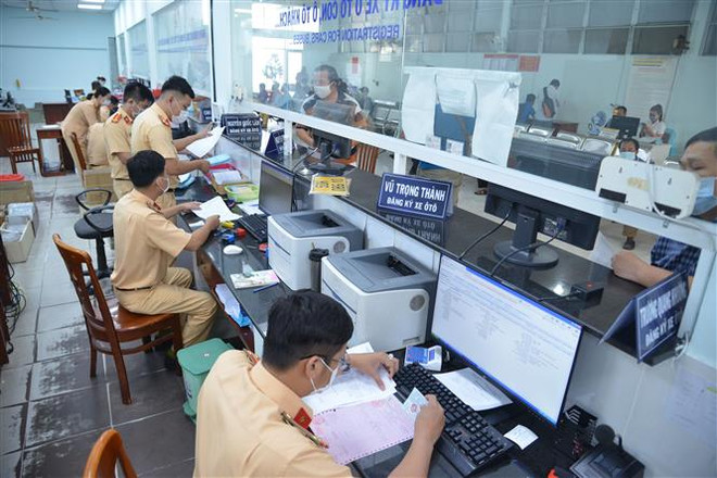 Người dân nên vào Cổng Dịch vụ công quốc gia để khai báo đăng ký xe ảnh 1