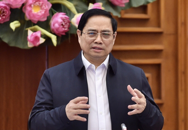 [Photo] Thủ tướng Phạm Minh Chính chủ trì cuộc họp về vaccine COVID-19 ảnh 1