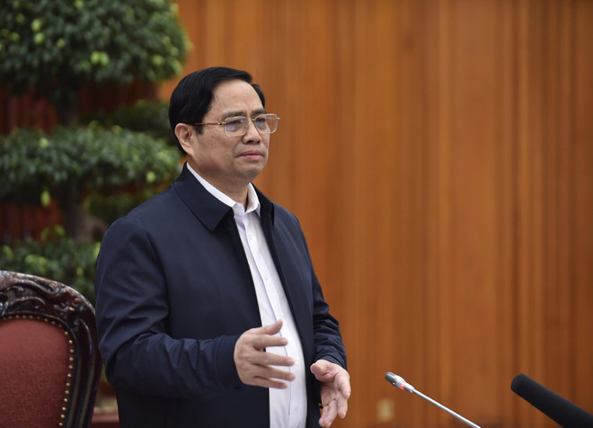 [Photo] Thủ tướng Phạm Minh Chính chủ trì cuộc họp về vaccine COVID-19 ảnh 2