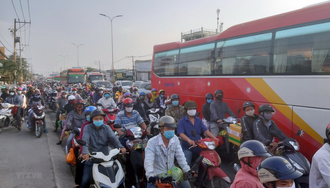 (Ảnh minh họa: Tiến Lực/TTXVN) Khó khăn trong việc kiểm tra khí thải xe máy tại Thành phố Hồ Chí Minh ảnh 1