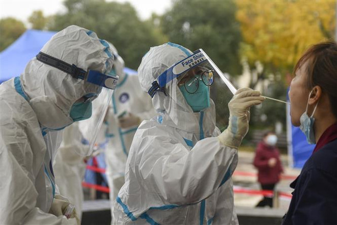 Trung Quốc: Chiết Giang đối phó với đợt bùng dịch đầu tiên trong năm ảnh 1