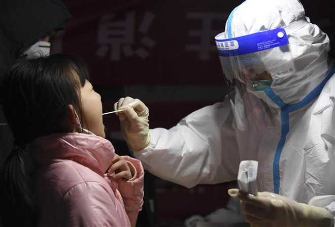 Trung Quốc ghi nhận số ca COVID-19 cộng đồng cao nhất trong gần 1 năm ảnh 1