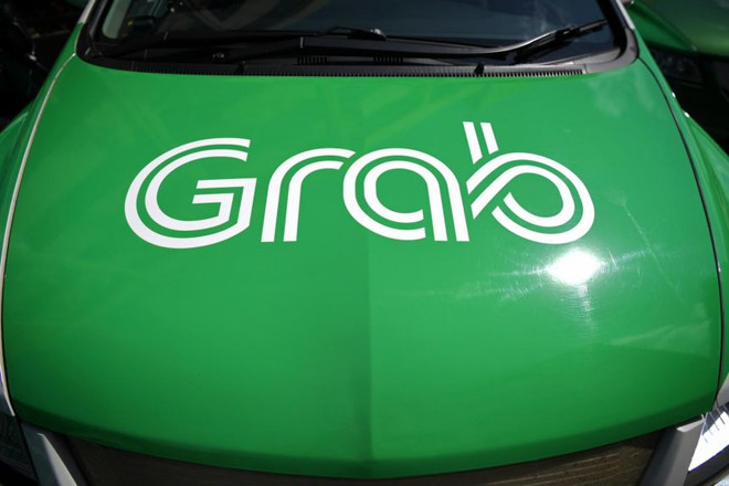 Grab niêm yết trên sàn chứng khoán Mỹ sau thương vụ sáp nhập kỷ lục ảnh 1