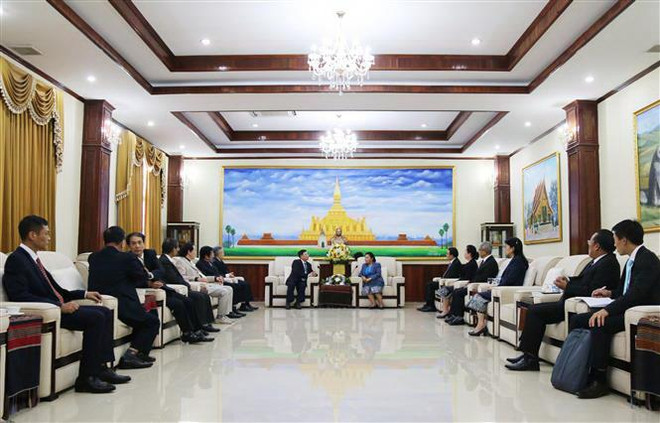 Ủy viên Trung ương Đảng, Trưởng ban Đối ngoại Trung ương Đảng nhân dân cách mạng Lào Sounthone Xayachak tiếp Đoàn đại biểu Trung ương Hội hữu nghị Việt Nam-Lào. (Ảnh: Xuân Tú/TTXVN) Quan hệ đặc biệt Việt Nam-Lào sẽ mãi không bao giờ phai nhạt ảnh 3