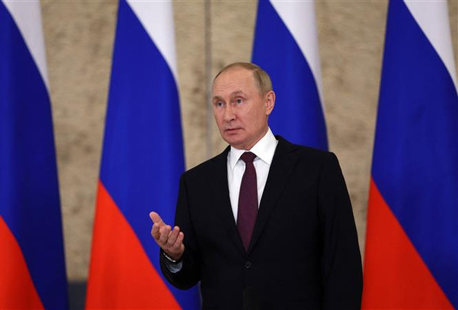 Tổng thống Nga Vladimir Putin. (Ảnh: AFP/TTXVN) Tổng thống Putin ký văn kiện sáp nhập 4 vùng lãnh thổ Ukraine vào Nga ảnh 1