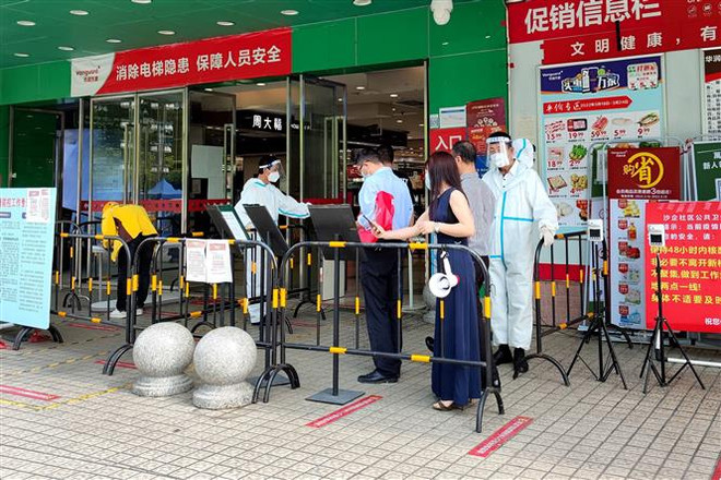 Thành phố Thâm Quyến triển khai các biện pháp mới phòng chống COVID-19 ảnh 1