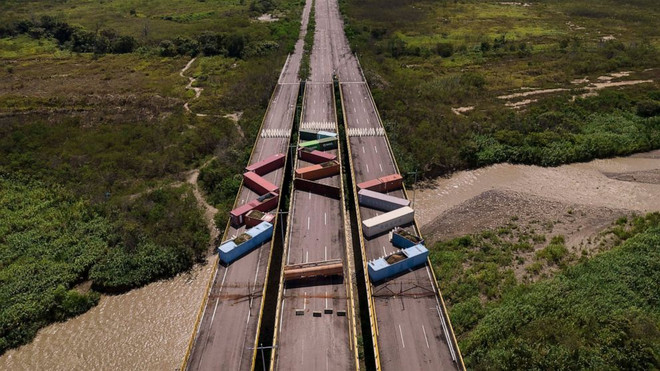 Trao đổi thương mại giữa hai nước đã bị gián đoạn từ 2015. (Nguồn: AP) Colombia và Venezuela nối lại các hoạt động giao thương đường bộ ảnh 1