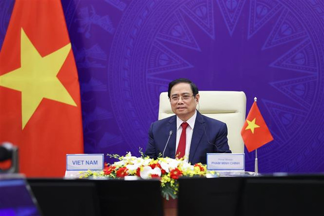 Thủ tướng Chính phủ Phạm Minh Chính tham dự Hội nghị quốc tế về Tương lai châu Á lần thứ 26 tại điểm cầu Hà Nội. (Ảnh: Dương Giang/TTXVN) Sự đồng thuận vì tương lai châu Á trong thời kỳ dịch bệnh hoành hành ảnh 1