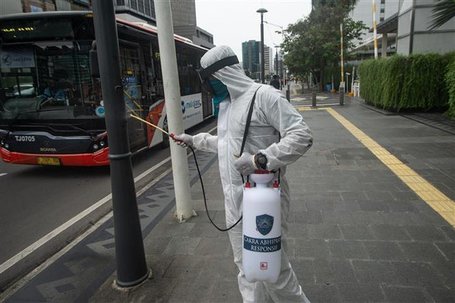 Dịch COVID-19 ở Đông Nam Á: Số ca bệnh lên cao, siết chặt việc đi lại ảnh 1