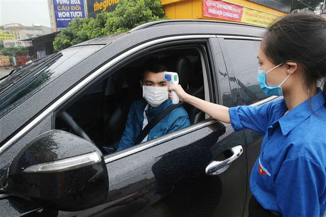 Báo Nga: Việt Nam là hình mẫu về kiềm chế hiệu quả đại dịch COVID-19 ảnh 1