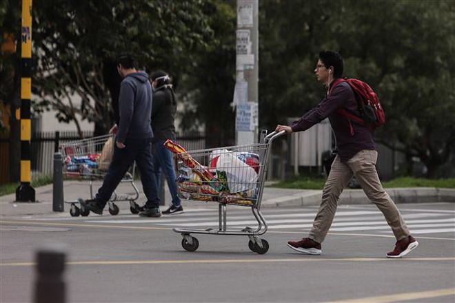 Dịch COVID-19 đến 21h ngày 7/4: Hơn 76.000 người tử vong trên toàn cầu ảnh 6