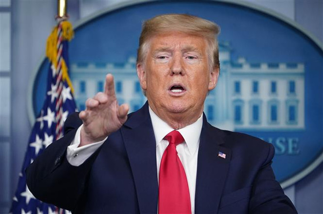 Tổng thống Mỹ Donald Trump. (Nguồn: AFP/TTXVN) 'Chiến dịch tuyên truyền' của Tổng thống Trump thời COVID-19 ảnh 1