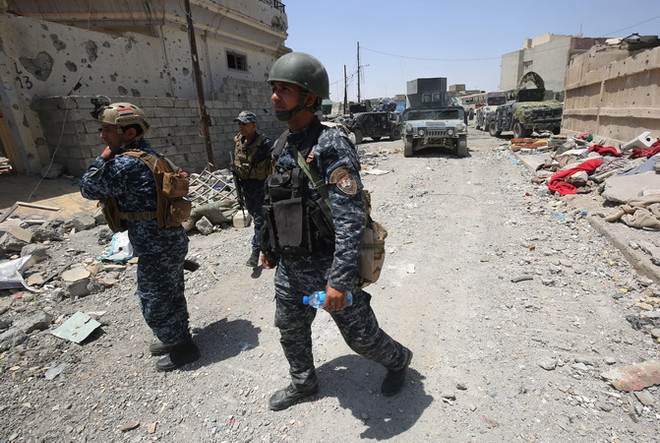 Lực lượng Iraq chỉ còn cách căn cứ địa của IS khoảng 300 mét ảnh 1