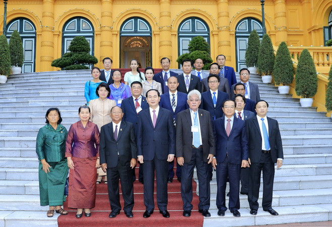 Chủ tịch nước Trần Đại Quang tiếp Chủ tịch Quốc hội Vương quốc Campuchia Samdech Heng Samrin đang thăm hữu nghị chính thức Việt Nam. (Ảnh: Nhan Sáng/TTXVN) Chủ tịch nước Trần Đại Quang tiếp Chủ tịch Quốc hội Campuchia ảnh 2